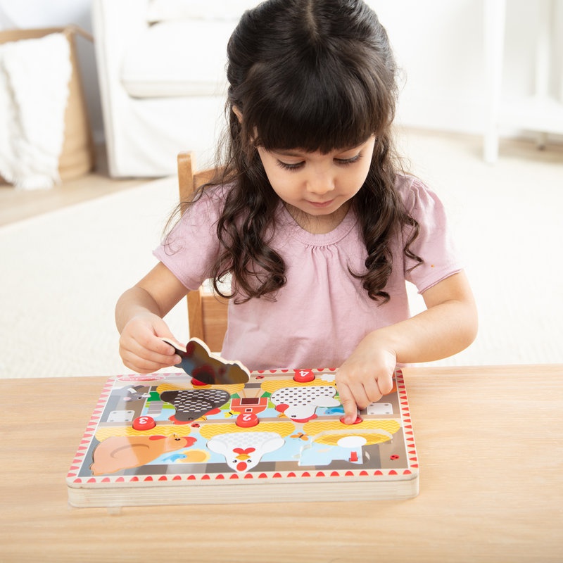 Melissa & Doug Drvene puzzle s iskačućim kokošima