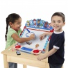 Melissa & Doug stolna kreativna ploča s motivom Psići u ophodnji