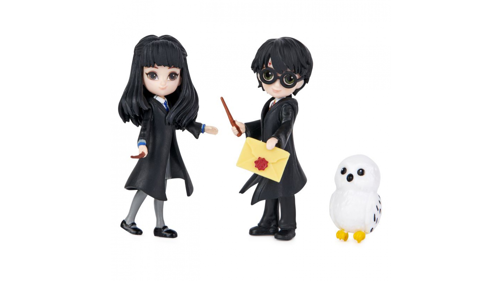 Výpredaj Harry Potter kúzelná palička so svietiacou kazetou + figúrky Harryho a Cho za polovicu