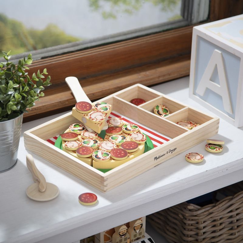ERBJUDANDE: Melissa & Doug pizza party set + Water WOW magi med vatten sagor GRATIS