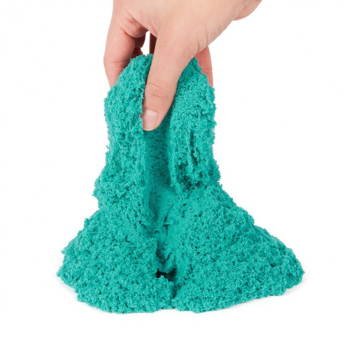Kinetic Sand form slott med flytande sand